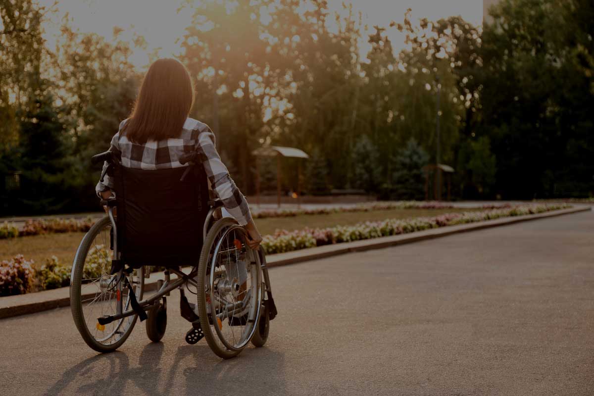 Women in wheelchair due to personal injury