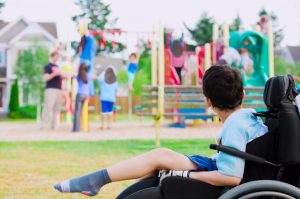 child with cerebral palsy at playground 