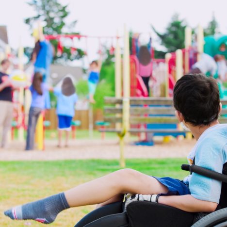 child with cerebral palsy at playground